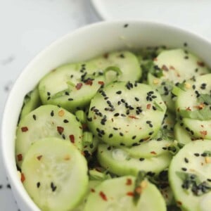 a bowl of asian cucumber salad