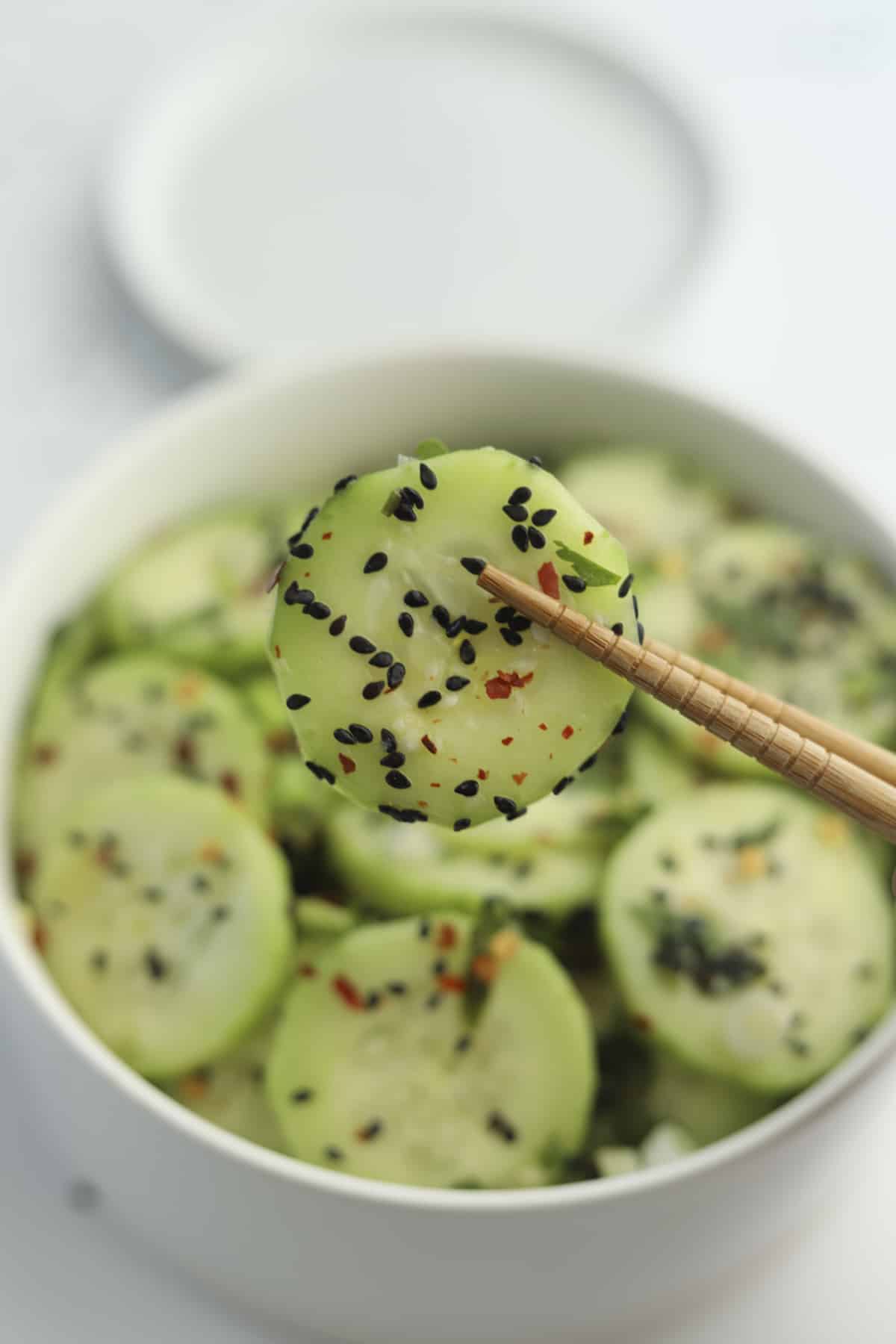 closeup of cucumber with black sesame seeds. 