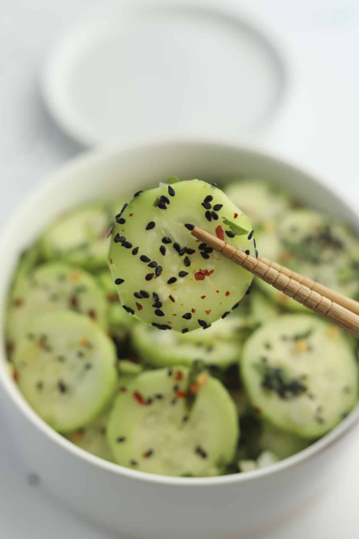 closeup of cucumber with black sesame seeds.