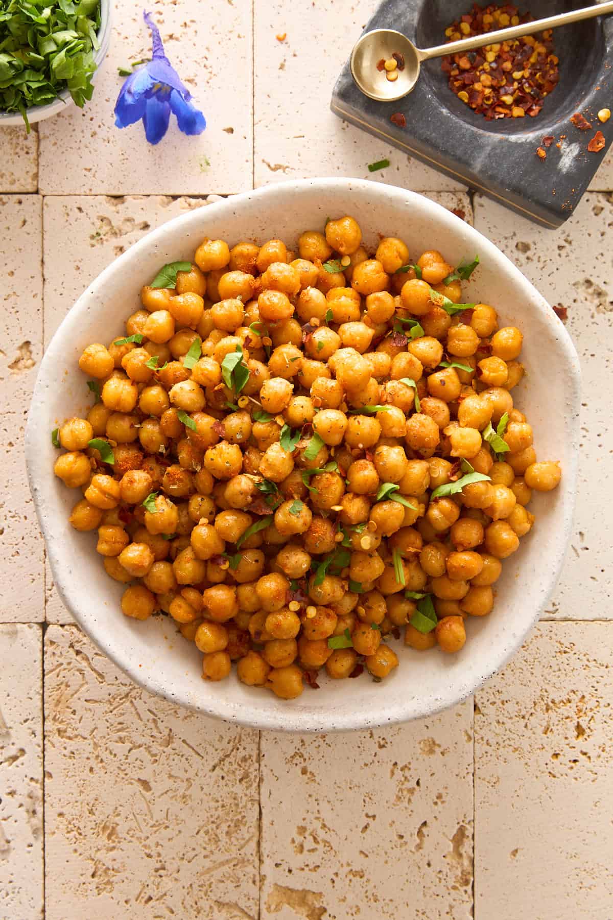 A bowl of seasoned air fryer chickpeas. 
