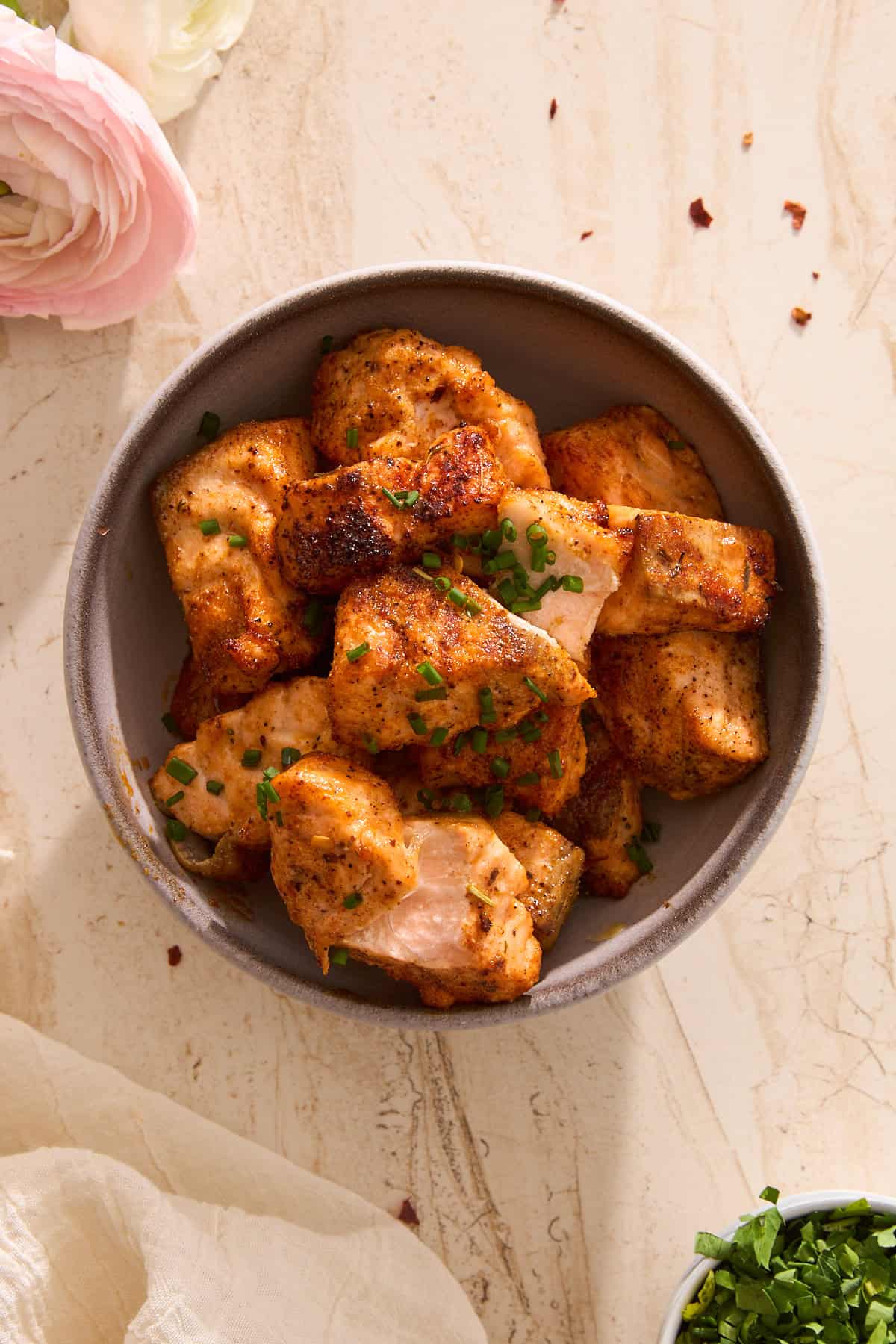 A bowl of air fryer salmon bites.