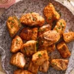 A plate of air fryer salmon bites.