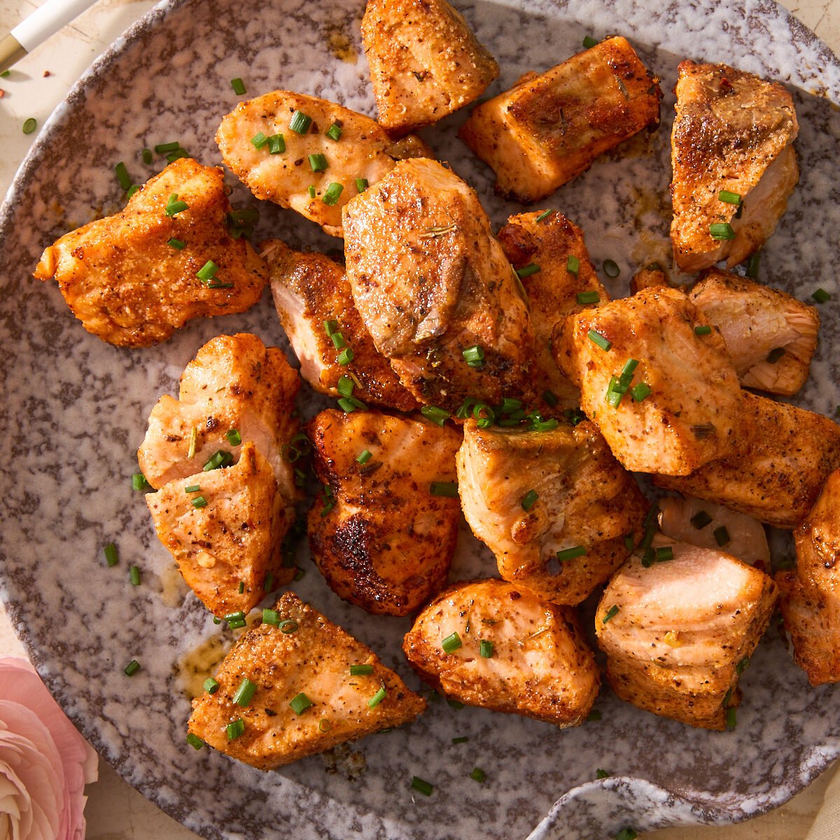 A plate of air fryer salmon bites.