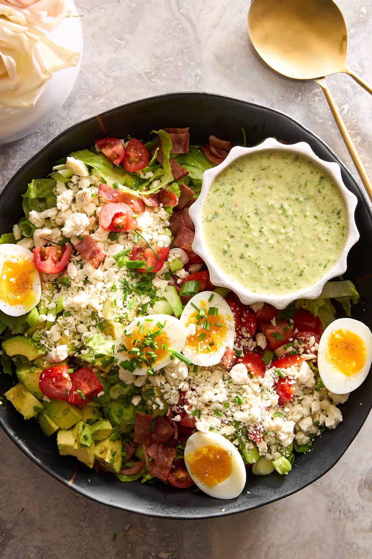 A Cobb salad with feta and green goddess dressing.