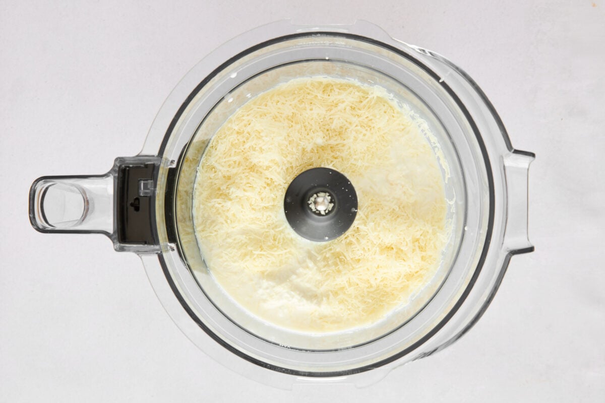 Cottage cheese blending in a food processor.