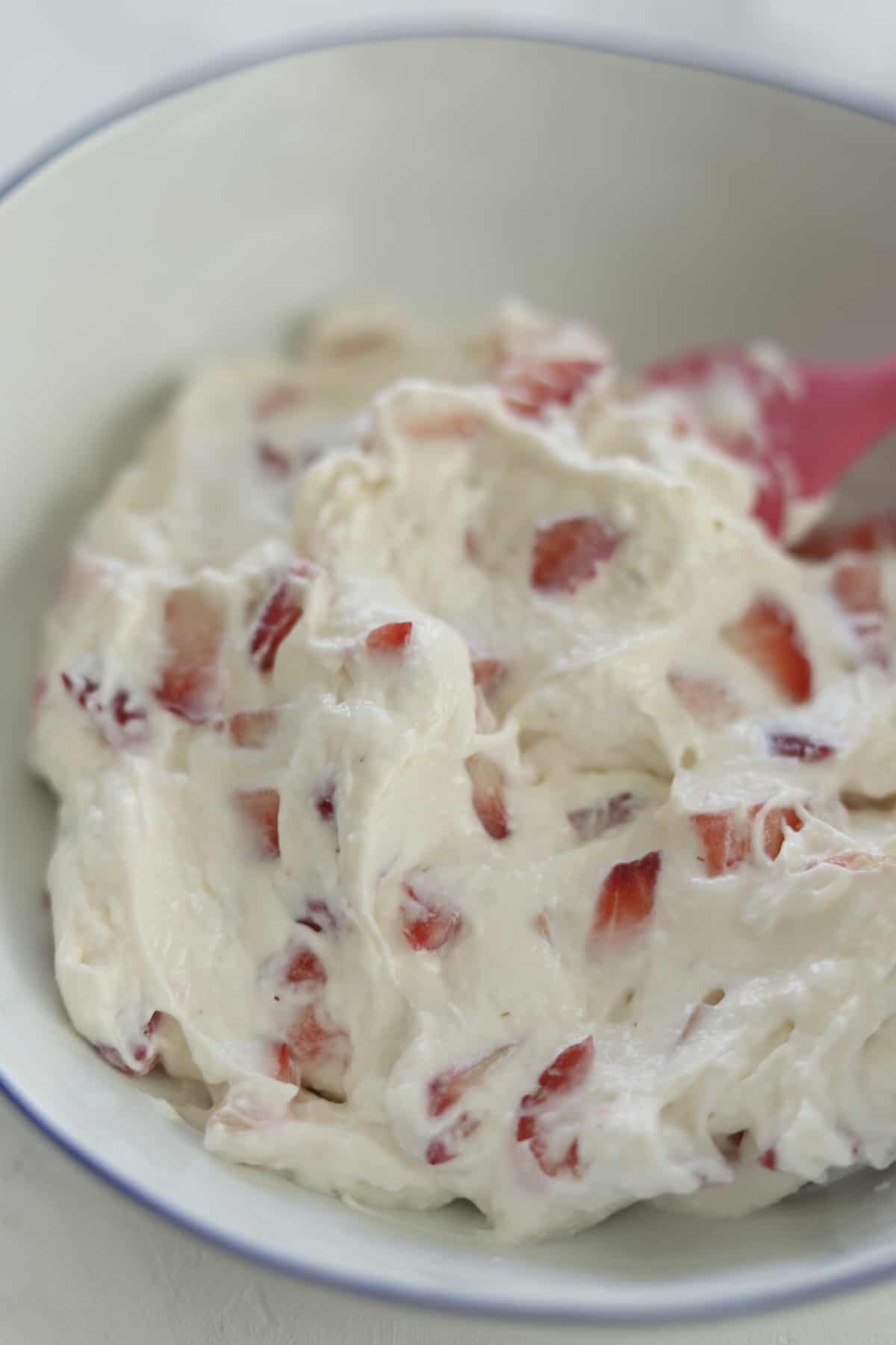 whipped cream mixture with chopped strawberries
