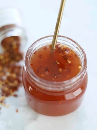 mason jar with honey comb spoon
