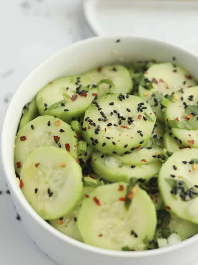 a bowl of asian cucumber salad.