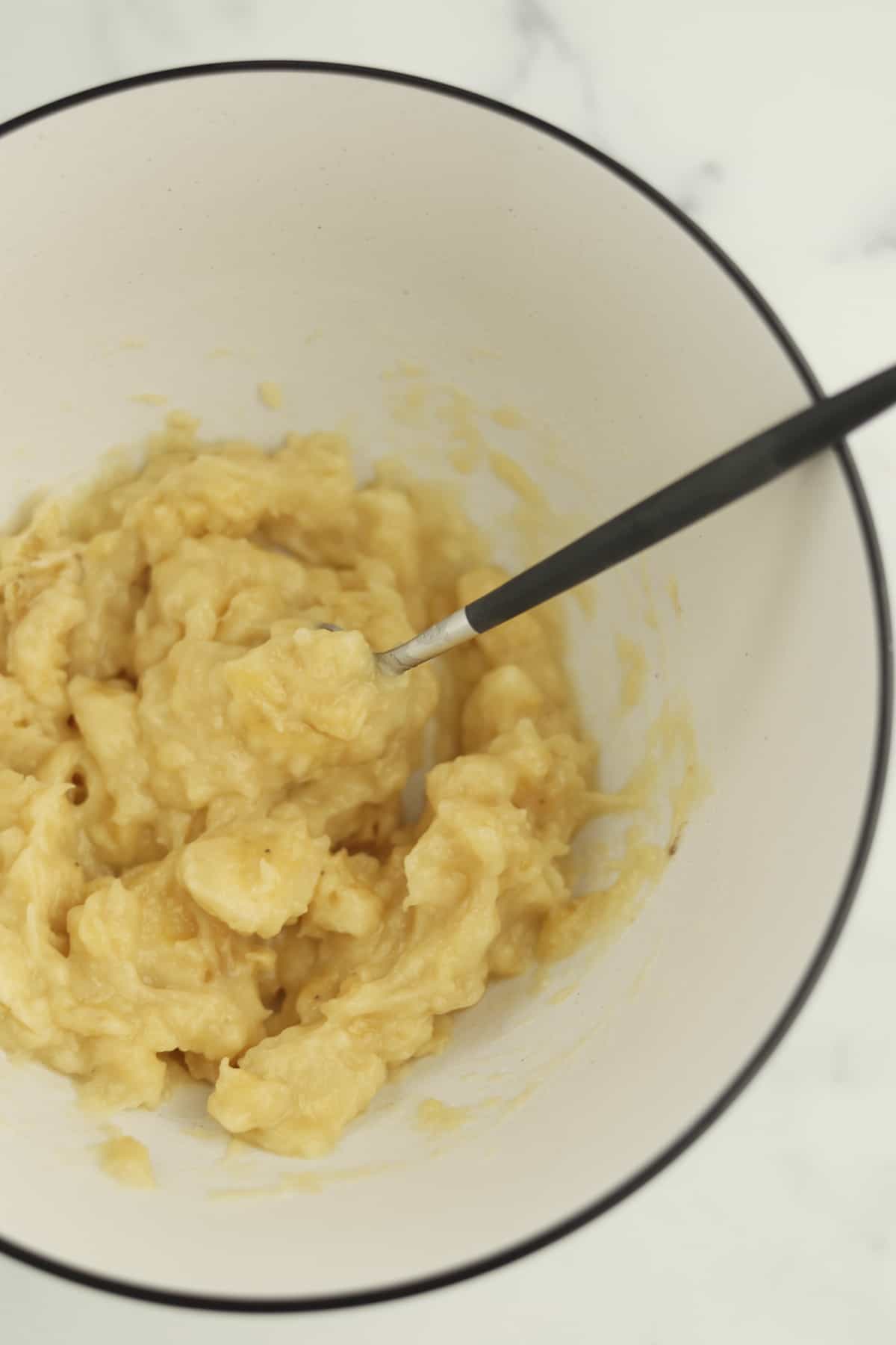 mashed bananas in a bowl 
