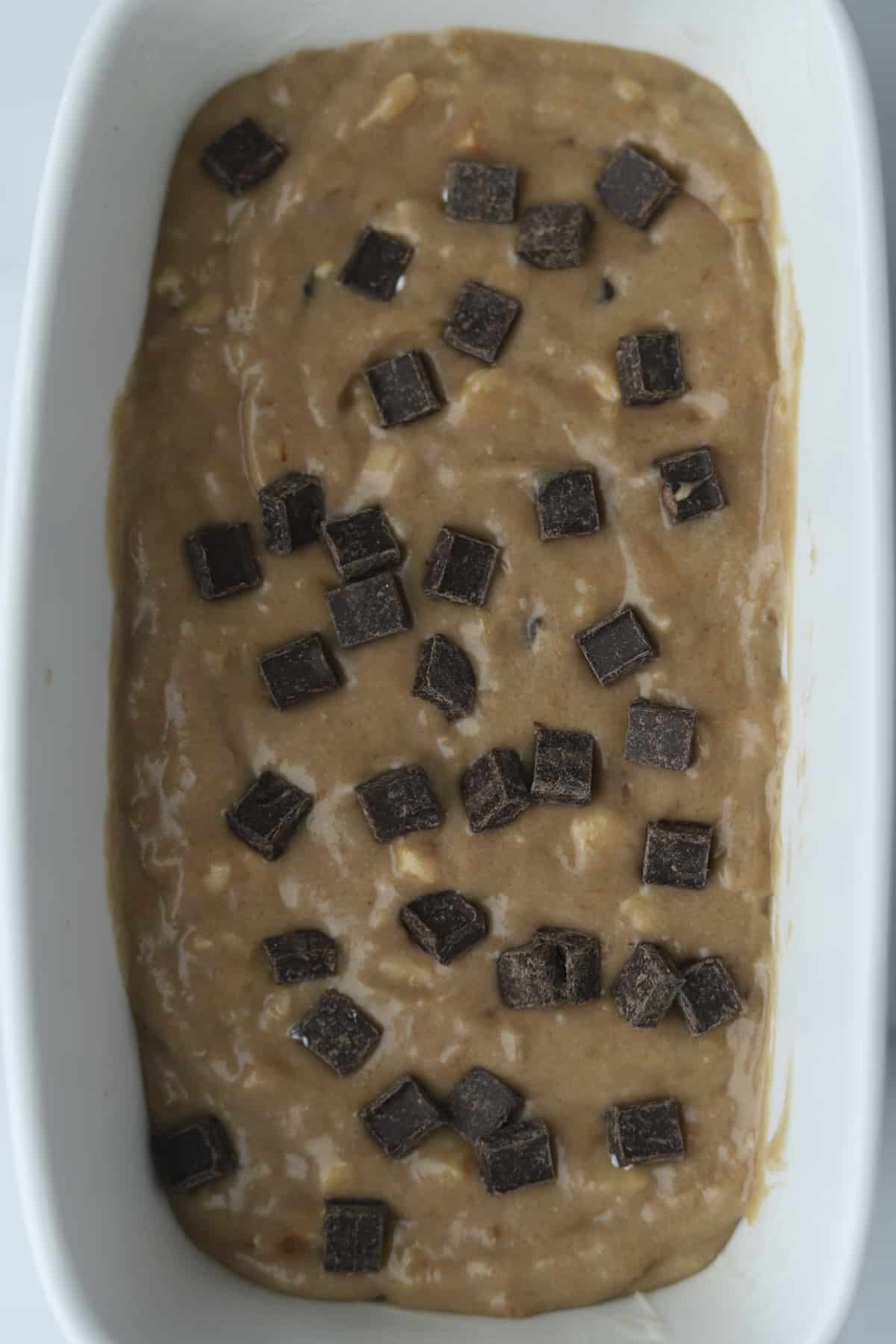 unbaked chocolate hazelnut batter in a baking dish 