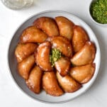 overhead atayef on platter with pistachios