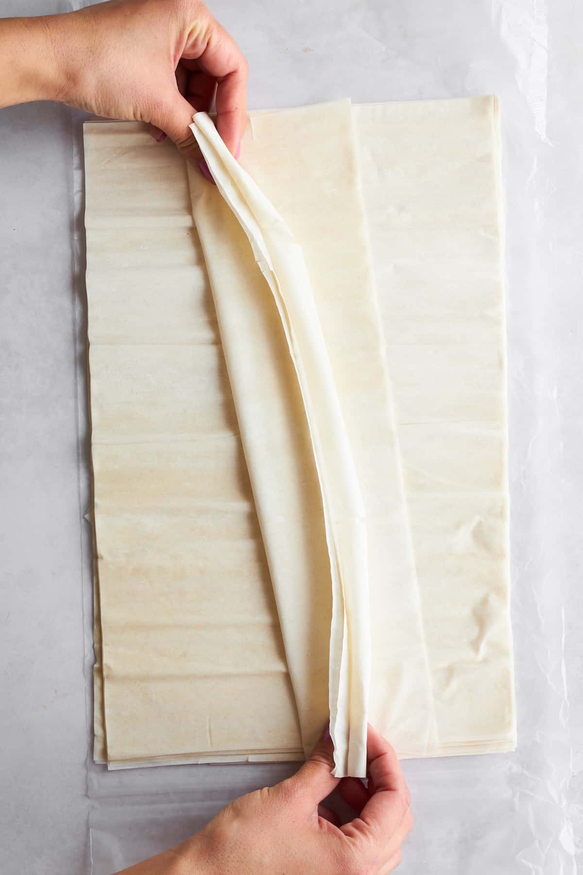 Phyllo dough being crinkled.