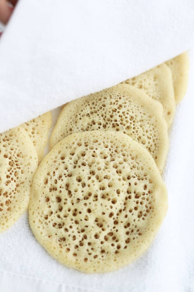 uncooked atayef on a towel