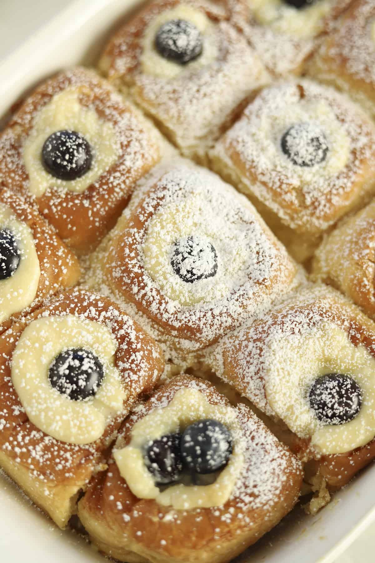 lemon blueberry french toast with ricotta filling topped with powdered sugar