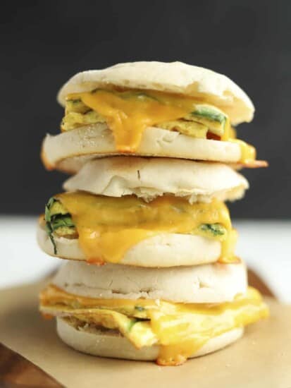 three protein packed egg muffin sandwiches stacked on top of each other