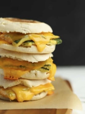a stack of three protein packed egg muffin sandwiches on top of each other