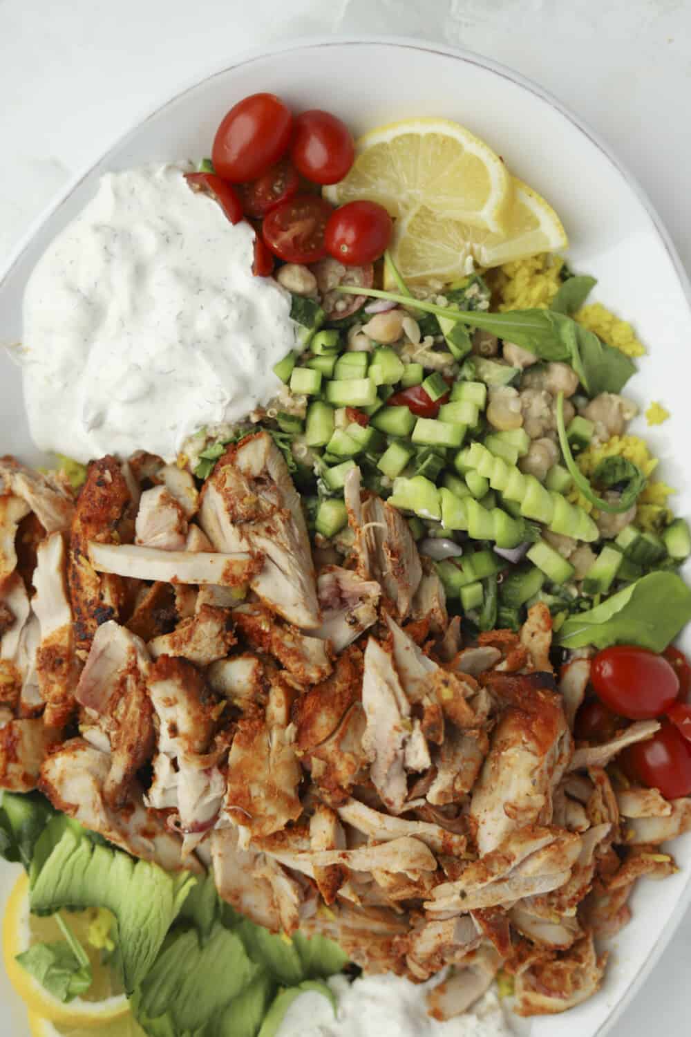 cut up chicken shawarma with fixings