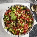 a bowl of Egyptian tomato & cucumber salad