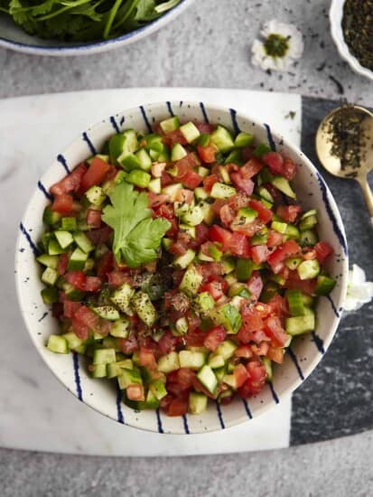 a bowl of Egyptian tomato & cucumber salad