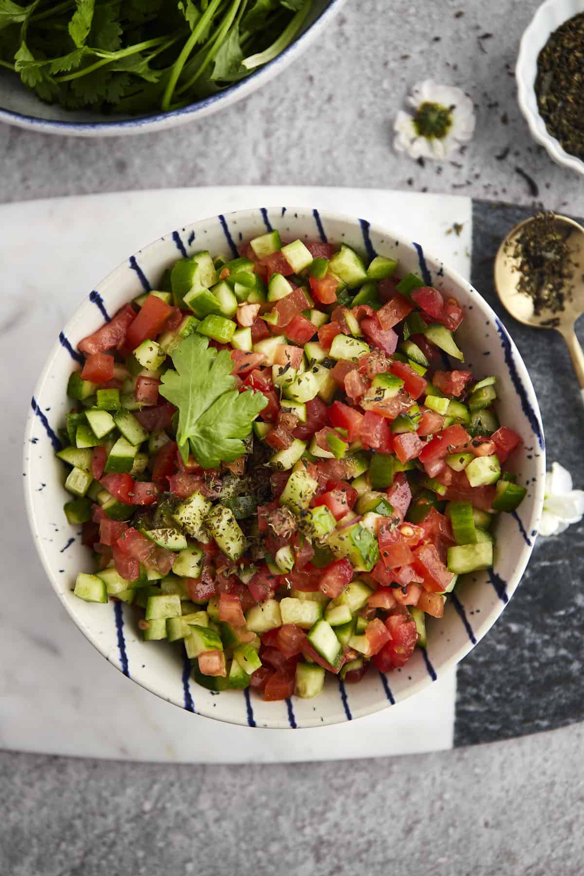 a bowl of Egyptian tomato & cucumber salad