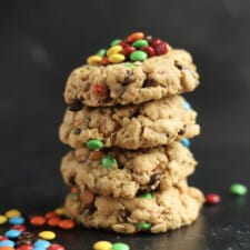 a stack of 4 monster cookies on top of each other