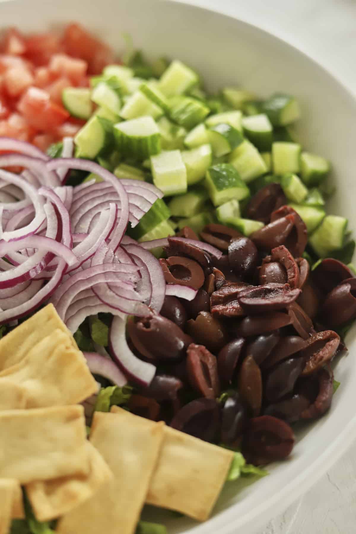 close up image of Greek salad in a bowl 