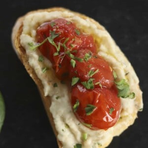 white bean dip with roasted tomatoes crostini