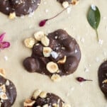 hazelnut chocolate crockpot candy on parchment paper