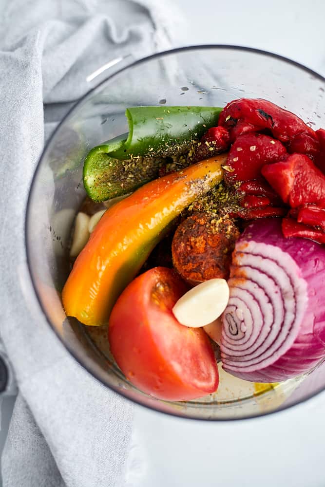 roasted red pepers, red onion, garlic, tomato, and fresno peppers in a food processor