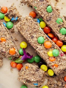 no-bake monster cookie energy bars topped with extra m&ms