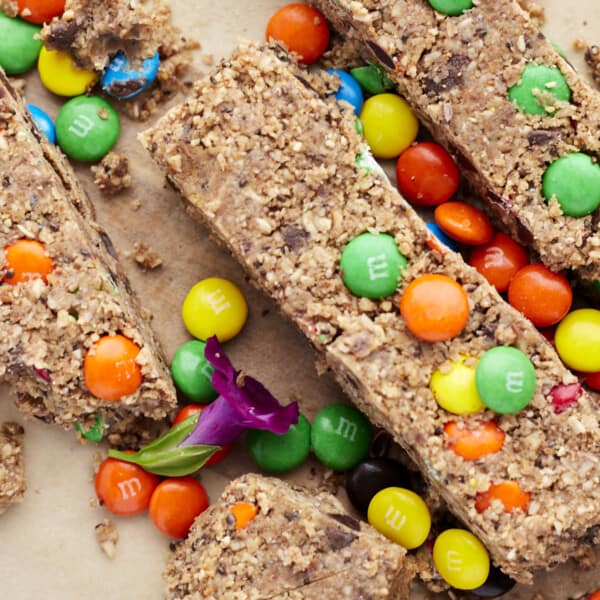 no-bake monster cookie energy bars topped with extra m&ms