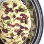baked easy focaccia with olives in a slow cooker