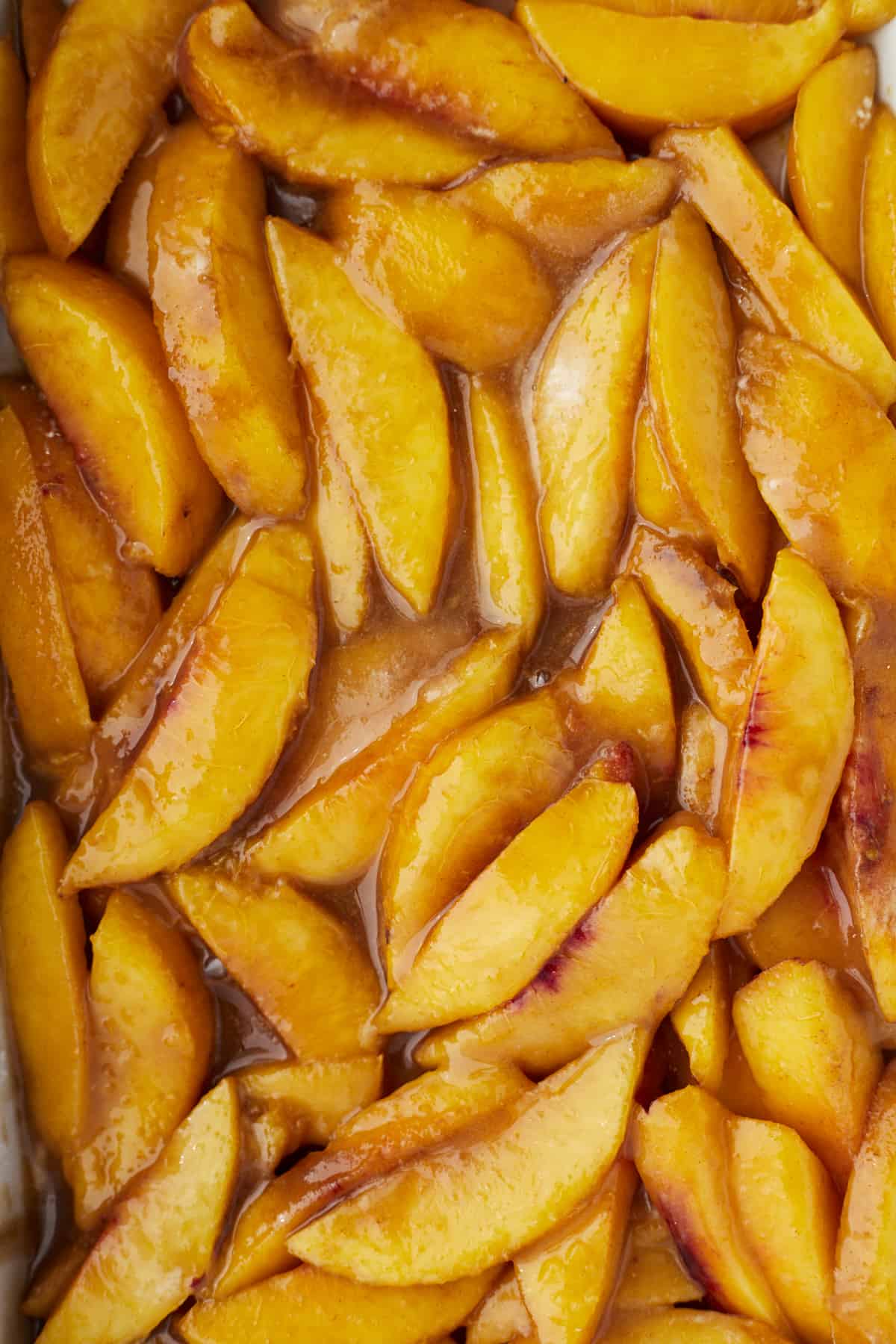 close up image of sugar and cinnamon coated peaches