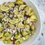 a bowl of lemon Greek potatoes