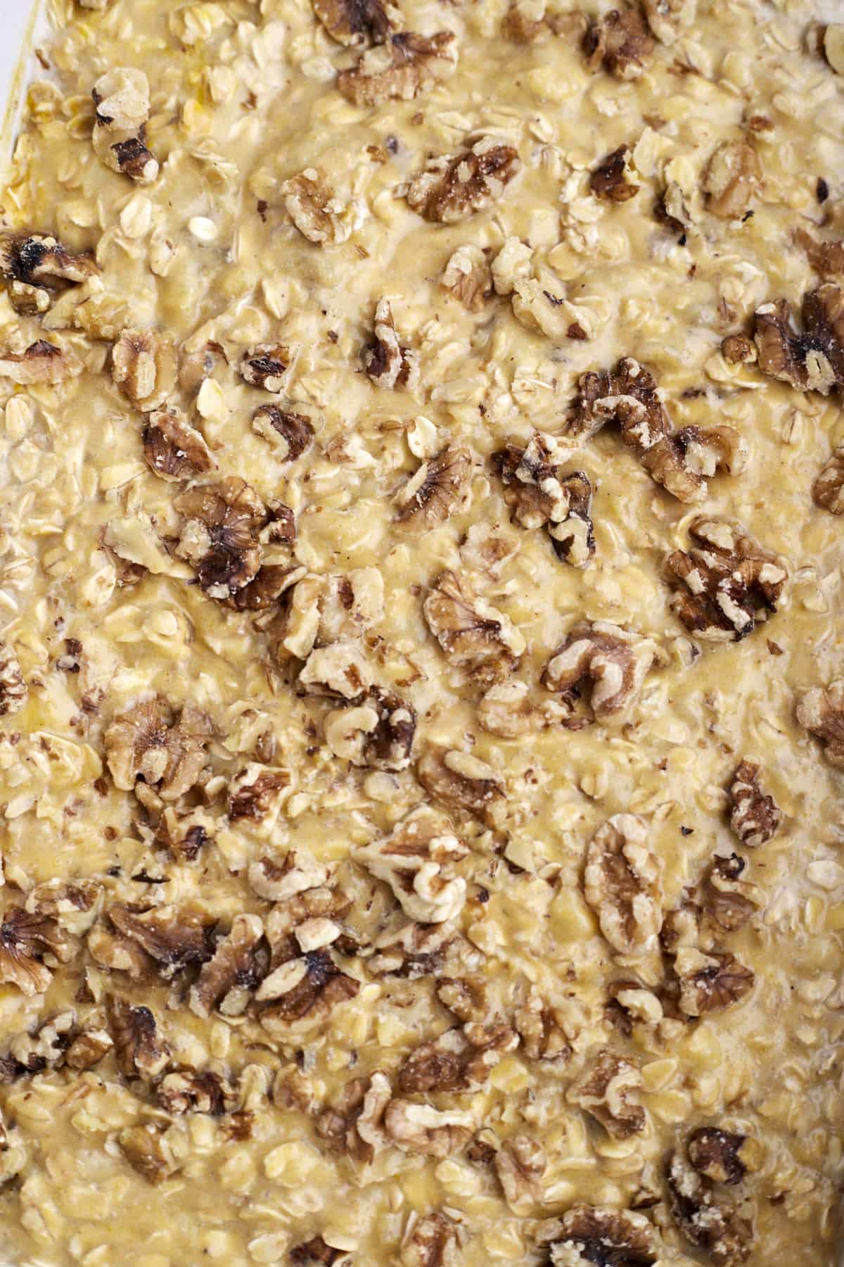 close up image of oatmeal with pumpkin and nuts