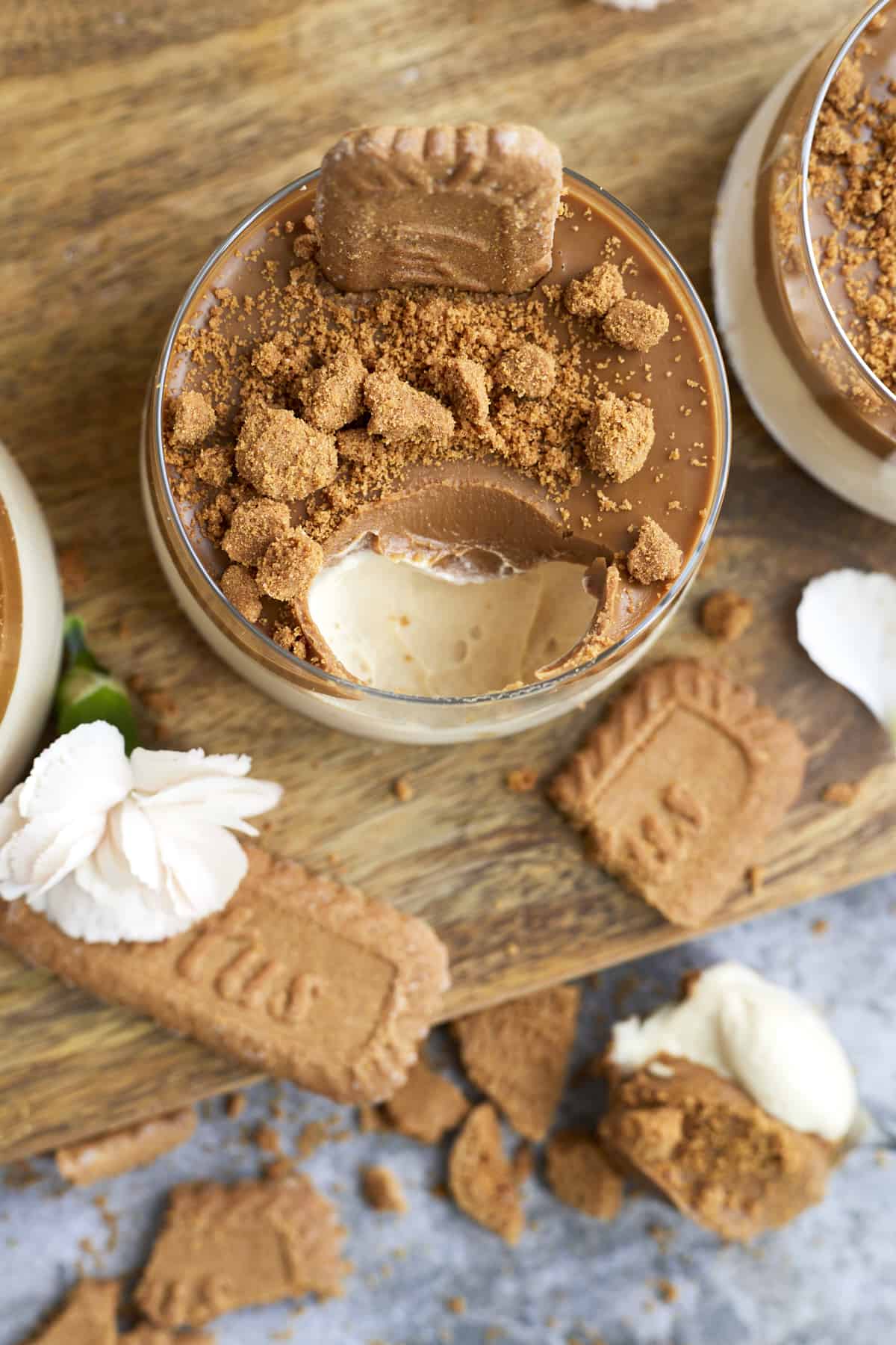 overhead image of a jar of Biscoff mousse with a bite taken out