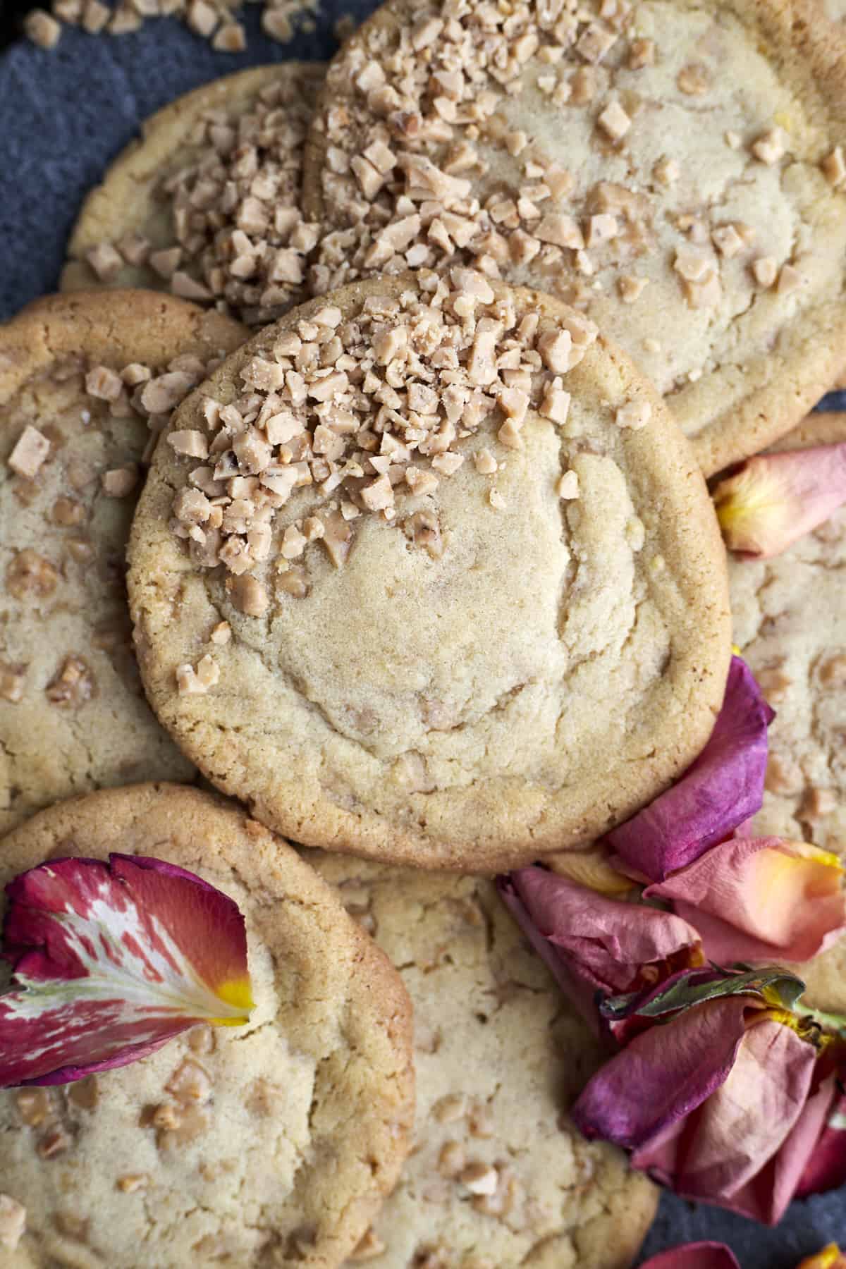 brown butter toffee cookies topped with toffee bits