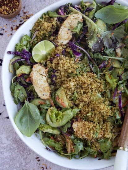 A Crispy Rice Bowl SweetGreen Copycat salad with serving tongs sticking out