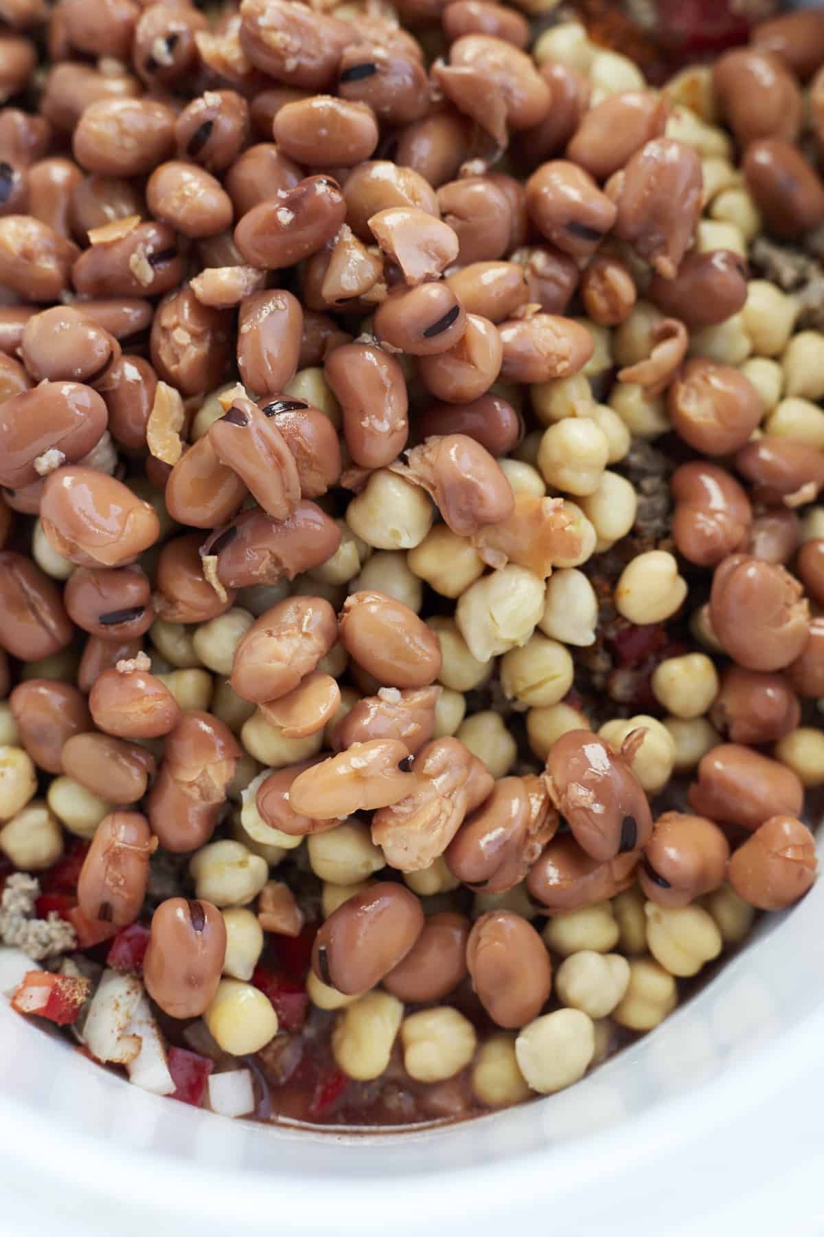 close up image of fava beans and chickpeas