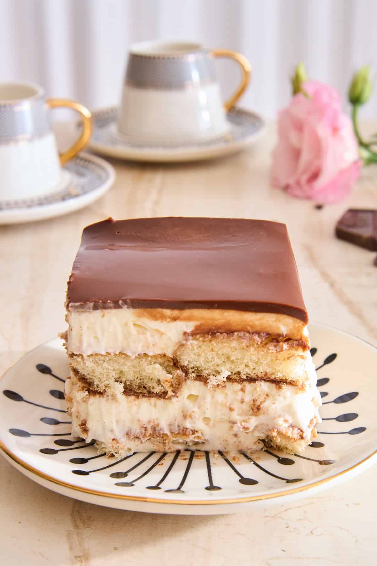 A slice of hot chocolate tiramisu on a plate