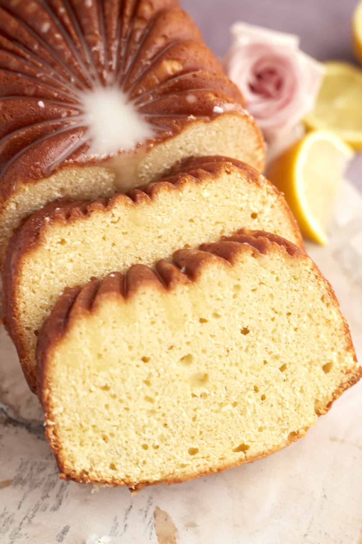 a lemon loaf with two slices cut