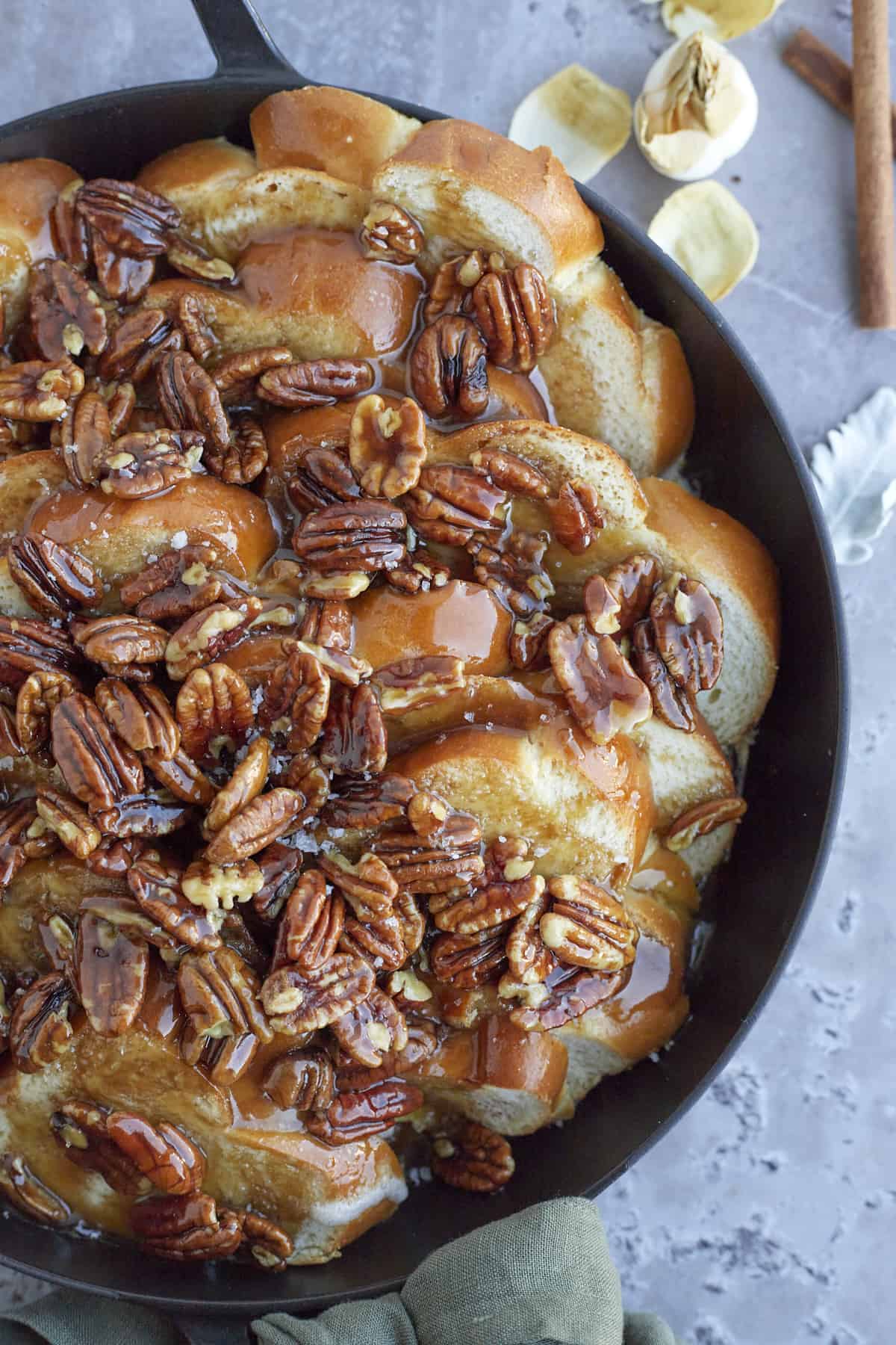 challah bread pecan pie french toast in a skillet
