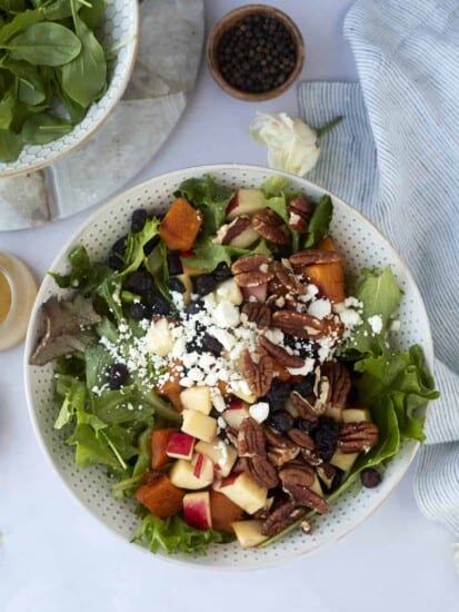 overhead image of a bowl of roasted butternut squash salad