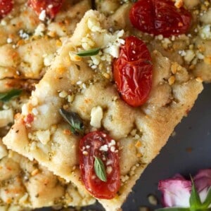 a piece of Easy Focaccia Recipe with Tomatoes