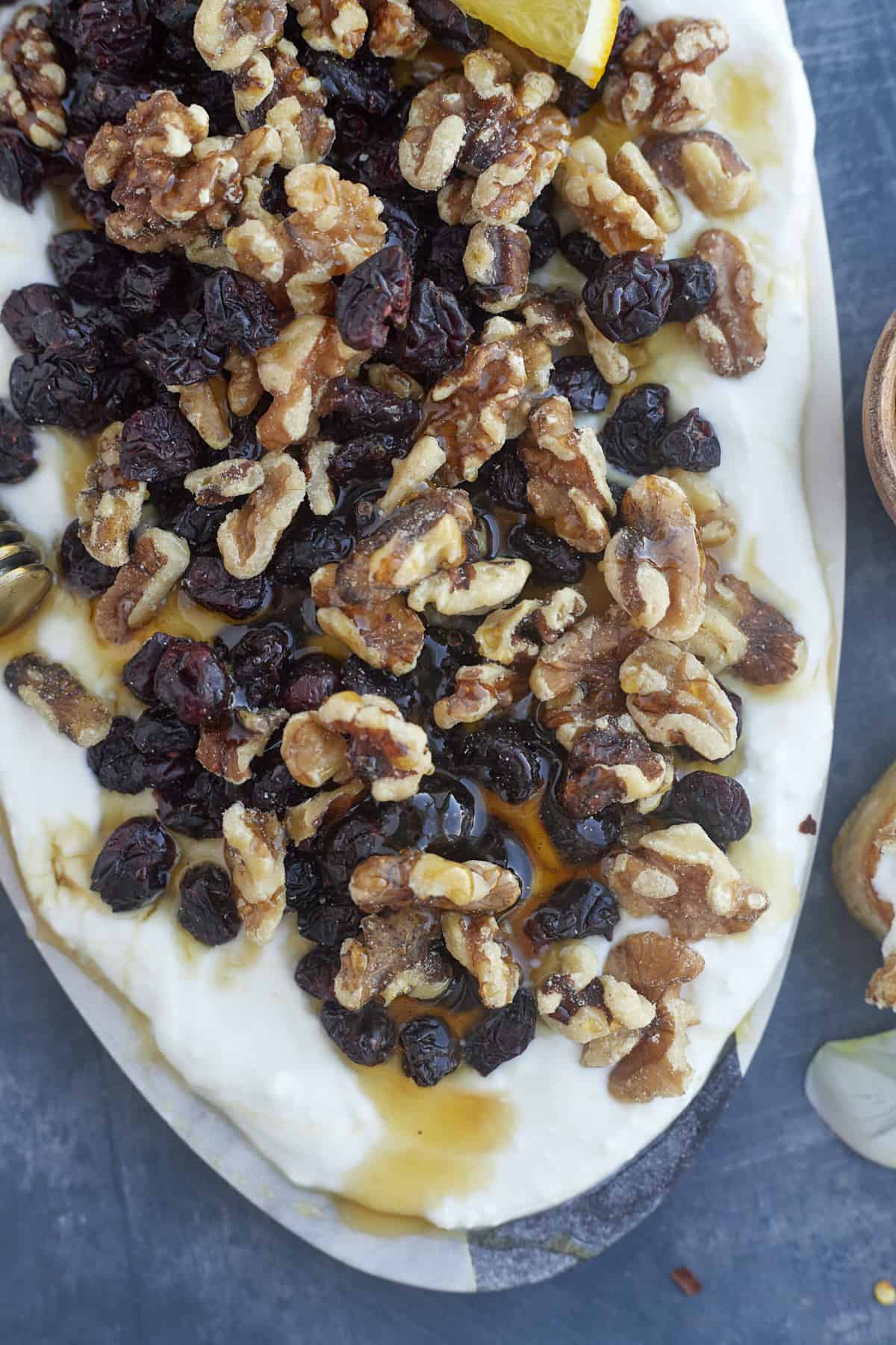 whipped feta topped with cranberries, walnuts, and a drizzle of honey