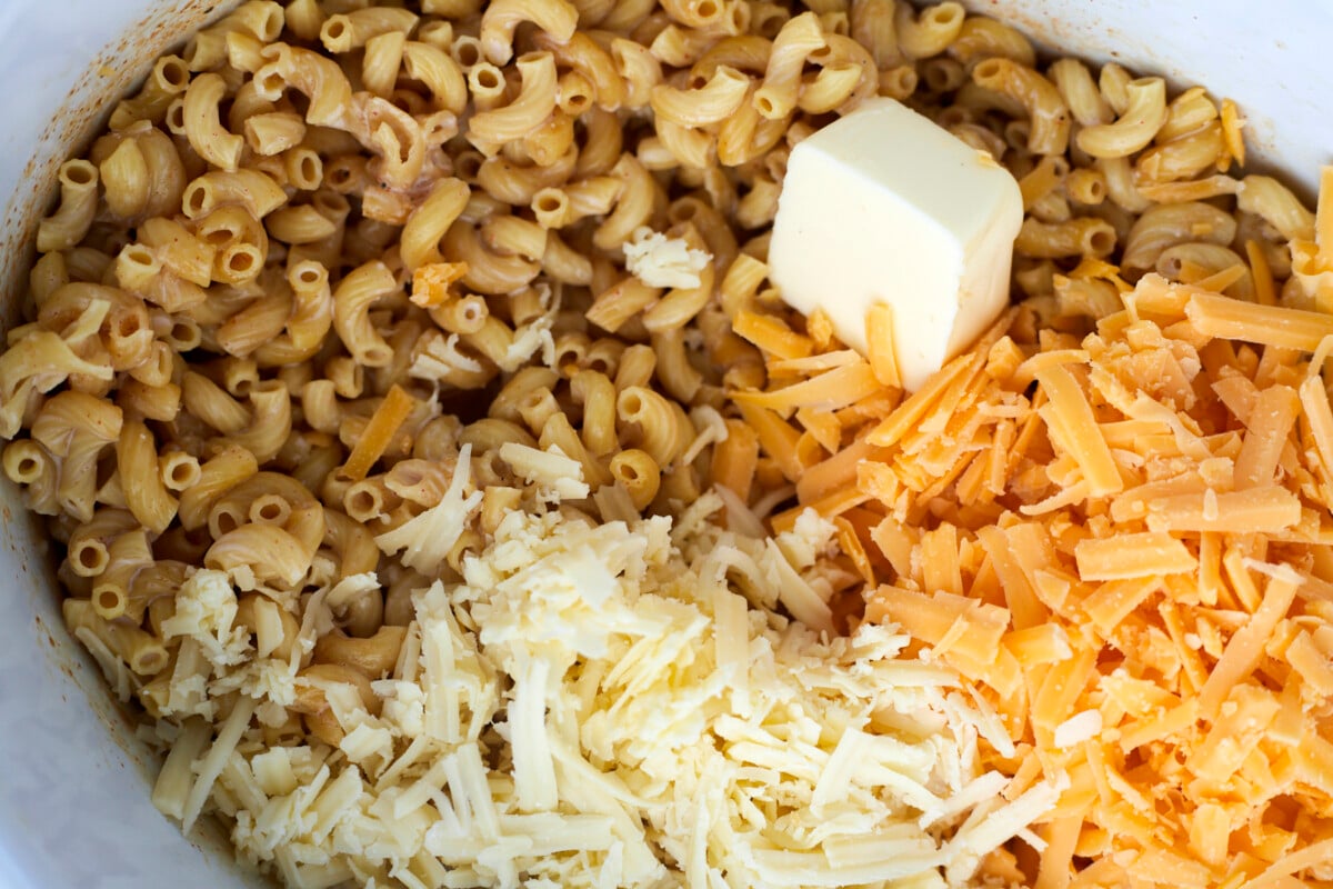 Ingredients for crockpot mac and cheese in the crockpot.