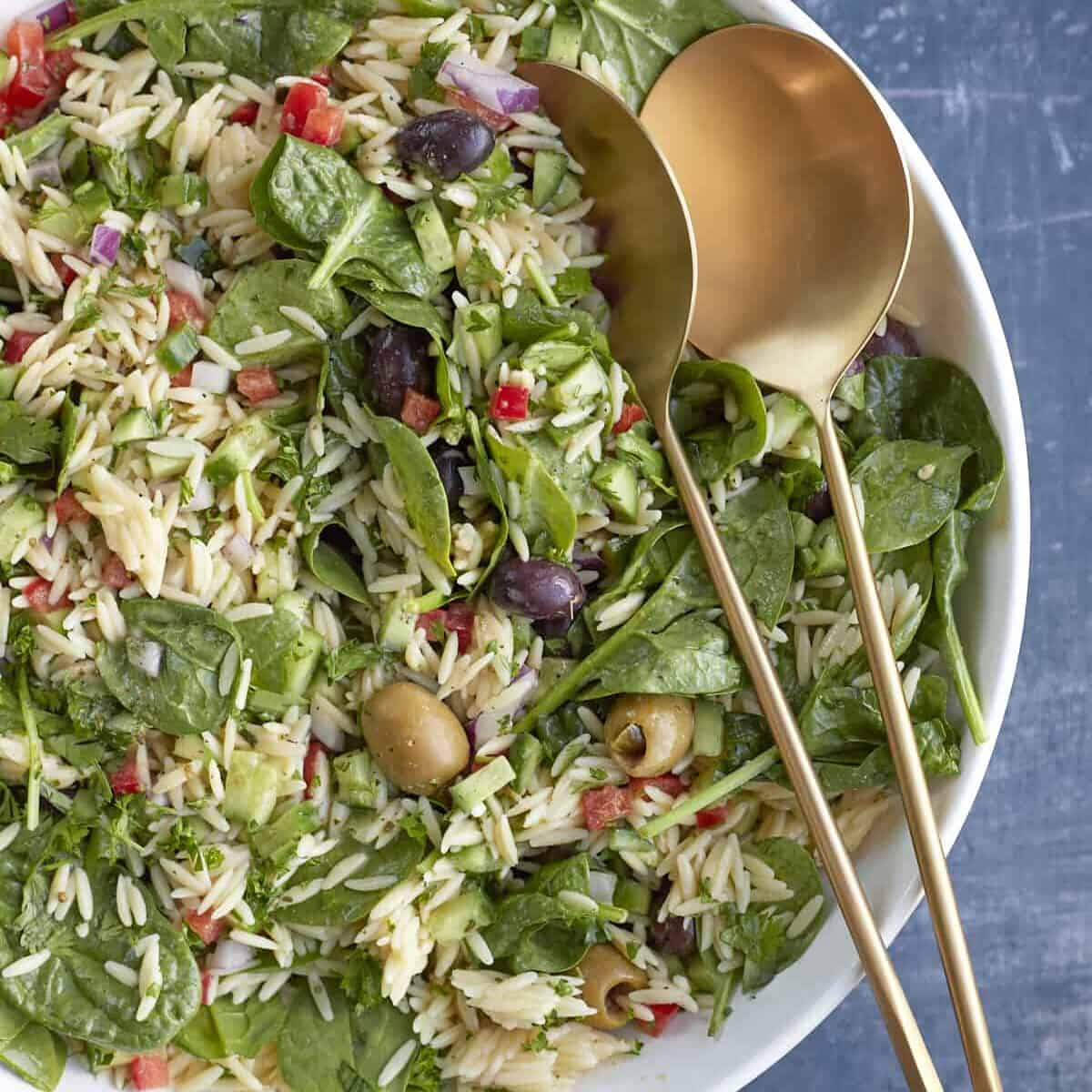 a bowl of Greek orzo pasta salad