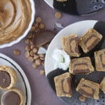 overhead image of plates full of Reese's peanut butter cup cookies