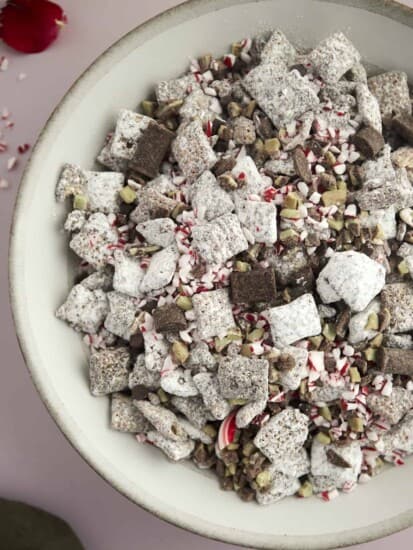 a bowl of chocolate peppermint Christmas puppy chow.