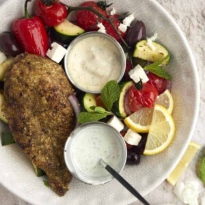 a bowl of za'atar chicken with vegetables